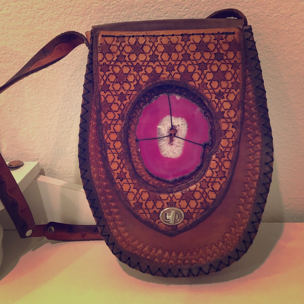 One of a kind leather bag with a pink stone